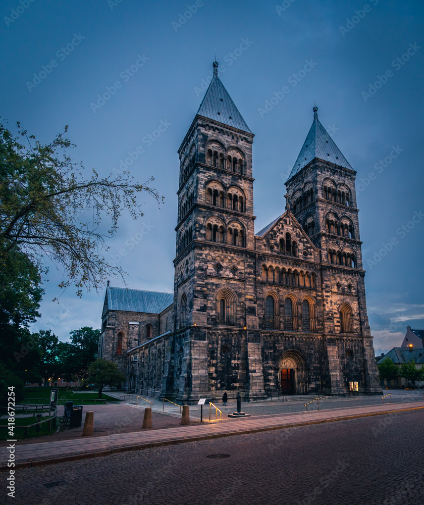 Naklejka premium The exterior of Lund cathedral during summer evening in medieval town of Lund Sweden