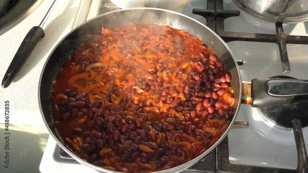 beans are stewed in a pan. healthy food concept beans are stewed in a pan. healthy food concept