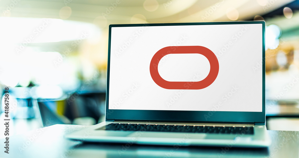 Laptop computer displaying logo of Oracle Corporation Stock Photo ...