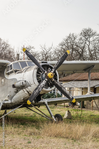 Novi Sad, Serbia - March 05. 2021: Propeller of a parked aircraft - Antonov (PZL-Mielec) An-2R, off the runway at the Aero Club Novi Sad, Serbia.