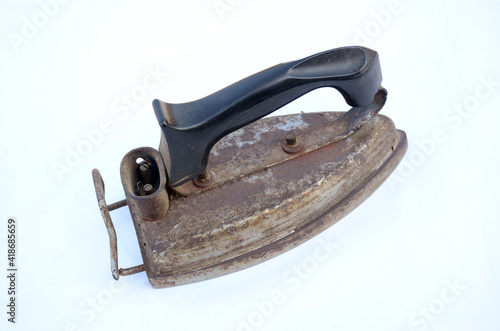 the black plastic metal old electric press isolated on white background.