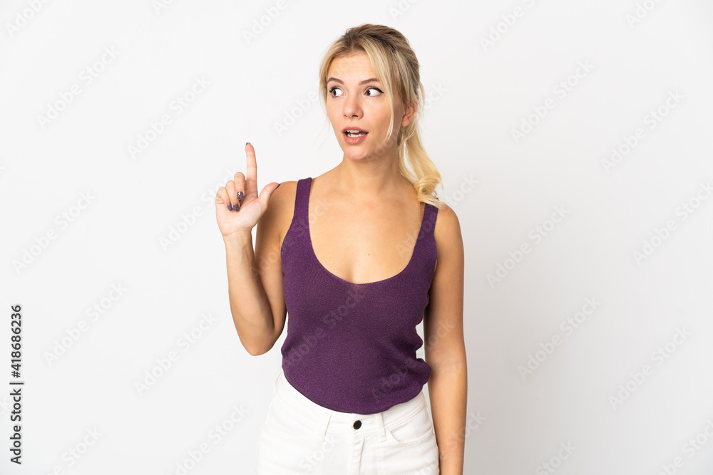 Young Russian woman isolated on white background thinking an idea pointing the finger up Young Russian woman isolated on white background thinking an idea pointing the finger up
