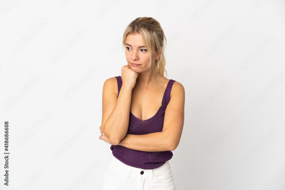 Young Russian woman isolated on white background with tired and bored expression Young Russian woman isolated on white background with tired and bored expression
