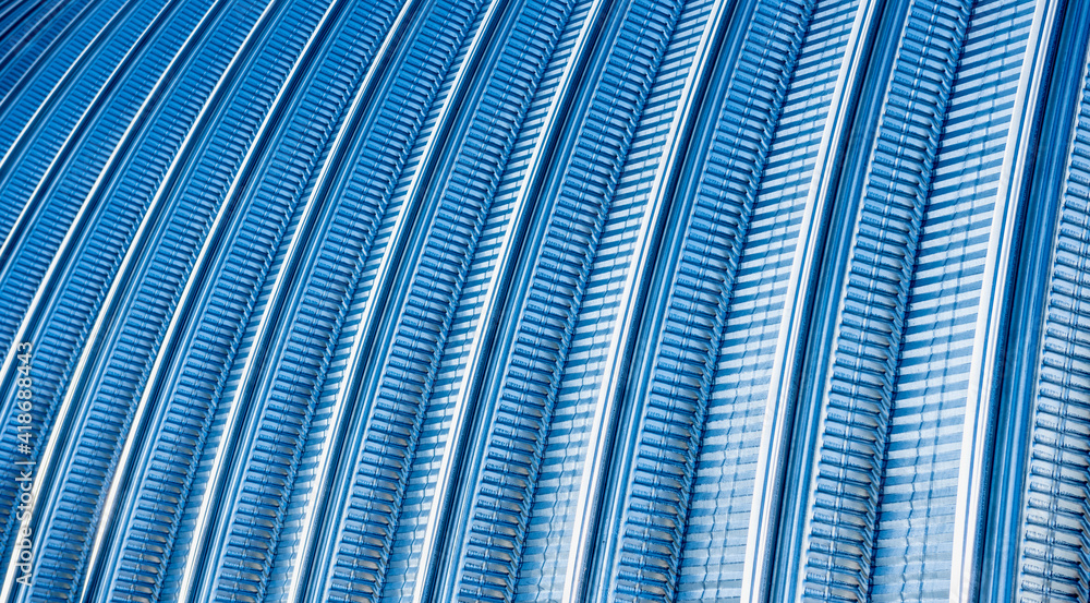 Obraz premium The surface of a industrial metal roof. Abstract background