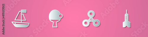 Set paper cut Toy boat, Racket and ball, Fidget spinner and Dart arrow icon. Paper art style. Vector.