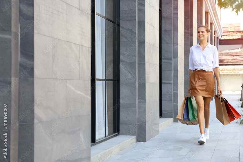 Beautiful lady woman relax walking on shopping street and feeling cheerful posing and happy holiday sale Beautiful lady woman relax walking on shopping street and feeling cheerful posing and happy holiday sale