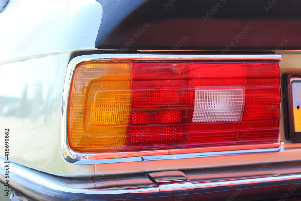 Large tail light of a retro car.