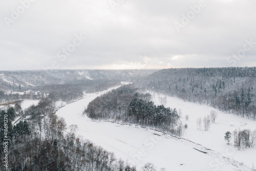 Snowy mountain river valley in Sigulda, Latvia © Andris