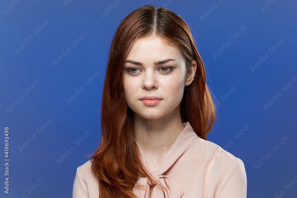 woman attractive look studio close-up blue background