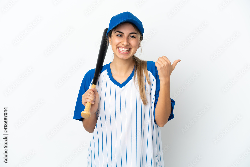 Young caucasian woman playing baseball isolated on white background pointing to the side to present a product Young caucasian woman playing baseball isolated on white background pointing to the side to present a product