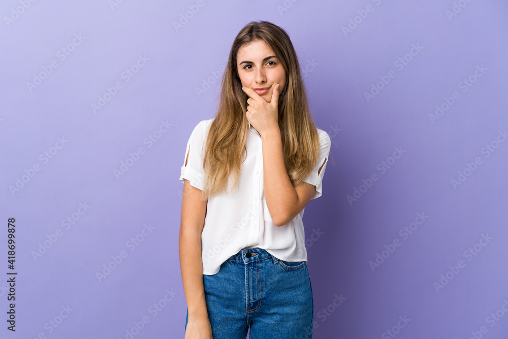 Young woman over isolated purple background thinking Young woman over isolated purple background thinking