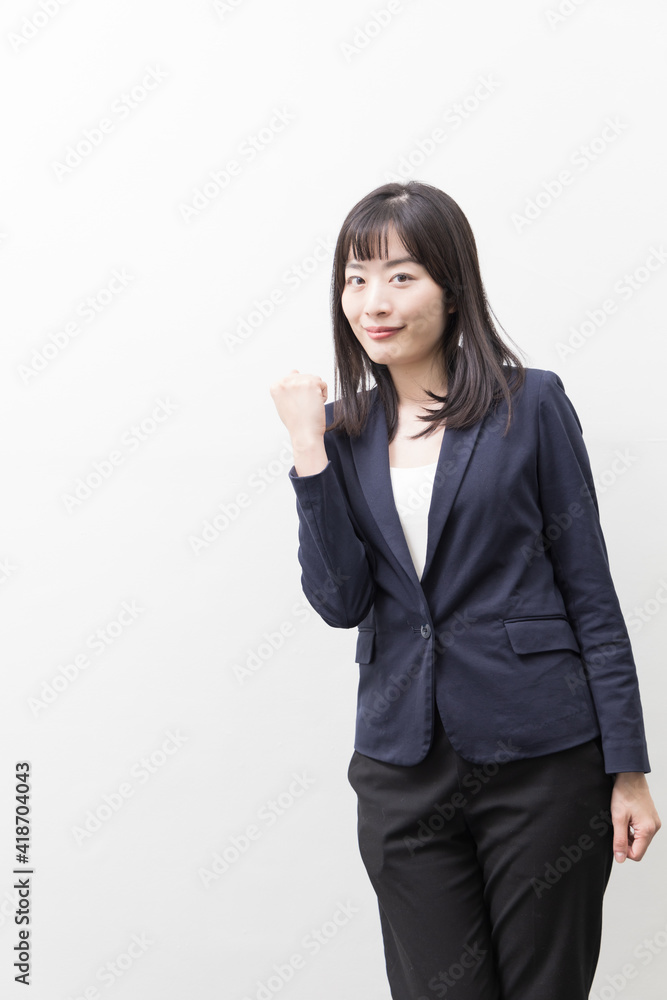 Woman raising her clenched fist (gesture) Woman raising her clenched fist (gesture)
