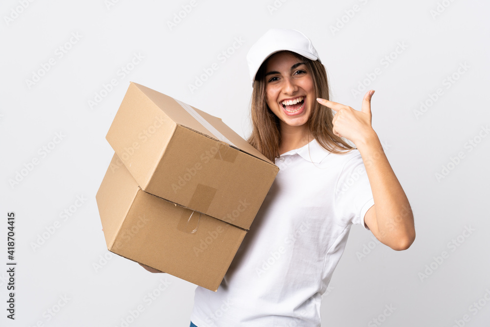 Young delivery woman over isolated white background giving a thumbs up gesture Young delivery woman over isolated white background giving a thumbs up gesture