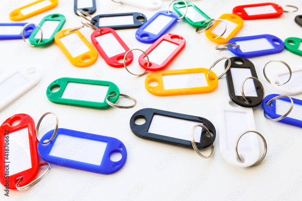 Colorful key tags on a light background. purchase of new real estate.