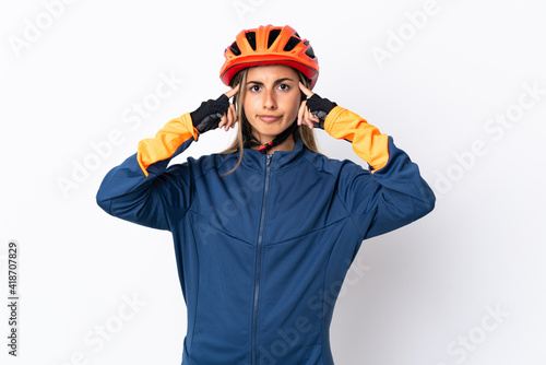 Young hispanic cyclist woman isolated on white background having doubts and thinking