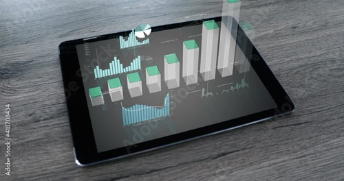 Digital animation of diagrams, graphs, numbers and evaluations appear on a tablet screen on a wooden table