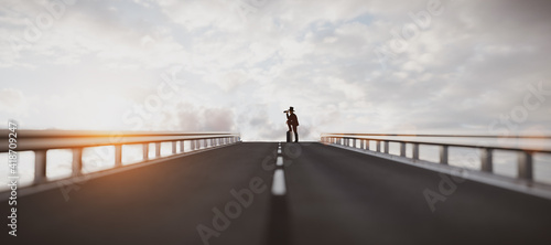 Businessman looking through binoculars searching or looking into future plan