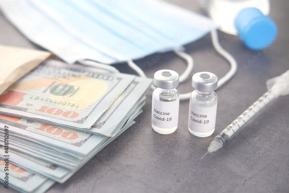 Healthcare cost concept with us dollar, mask, vaccine and pills 