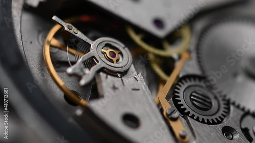 Wallpaper Mural Close-up of the work of the mechanism and pendulum of an old mechanical wristwatch. The concept of the passage of time Torontodigital.ca