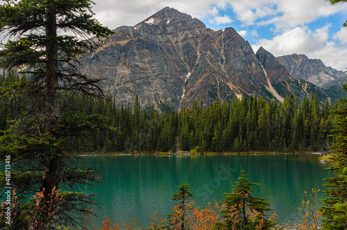 Peak over Turquoise Lake and Pines