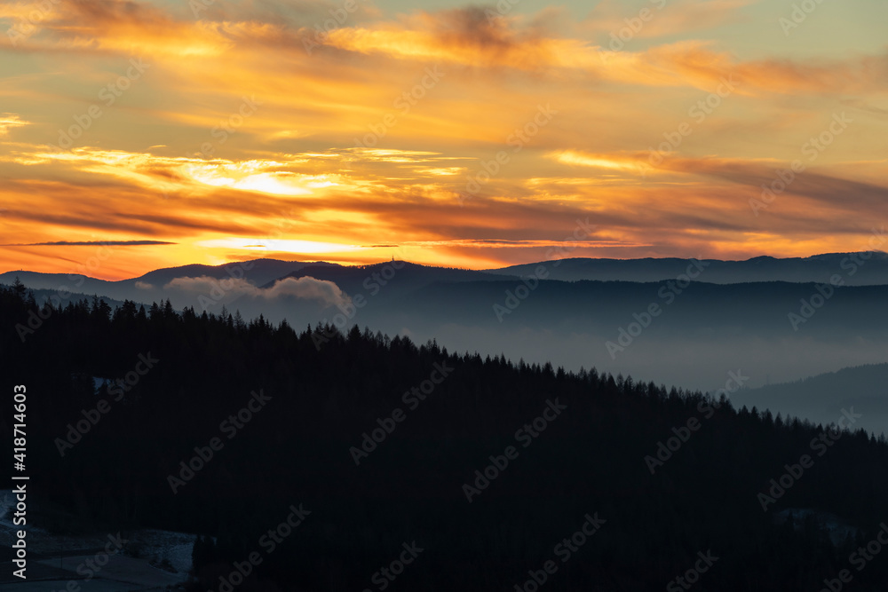 Sunrise on Mount Koskowa with view of the Tatras and the Polish beskid mountains. Colorful sky, golden hour