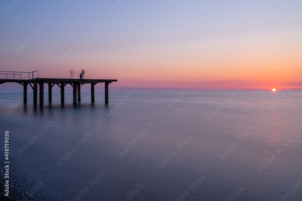 Pier At The Sunset