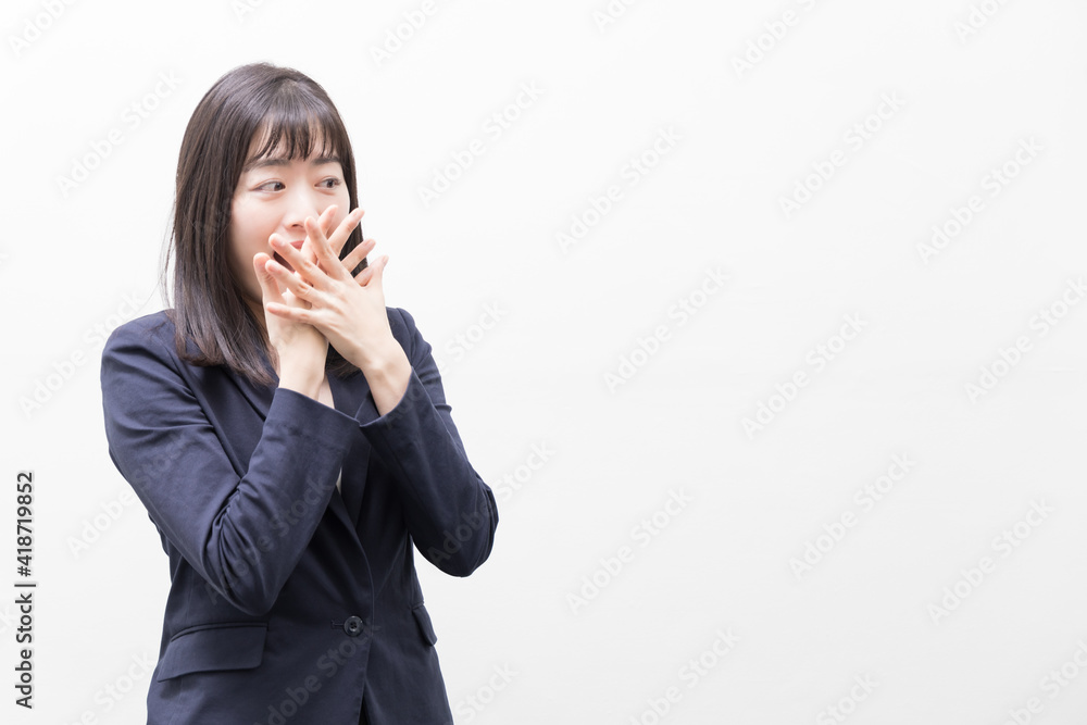 Woman standing and surprised by something Woman standing and surprised by something