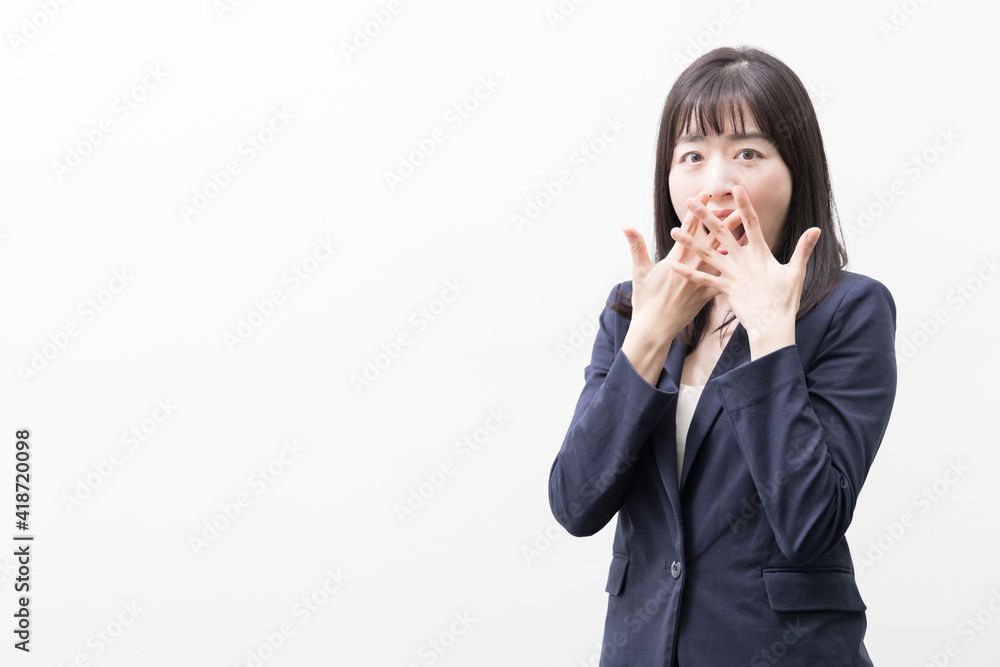 Woman standing and surprised by something Woman standing and surprised by something