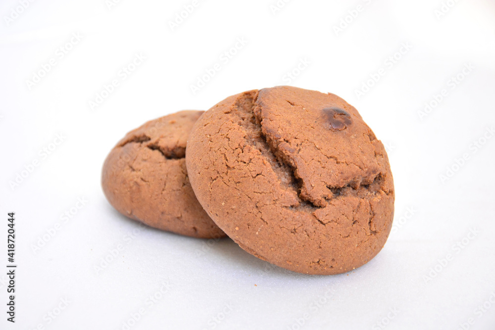 Oatmeal cookies close-up on a white background. Round biscuits close-up. Sweet pastries. Oatmeal cookies close-up on a white background. Round biscuits close-up. Sweet pastries.