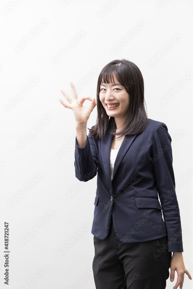 Woman expressing OK sign (gesture) Woman expressing OK sign (gesture)