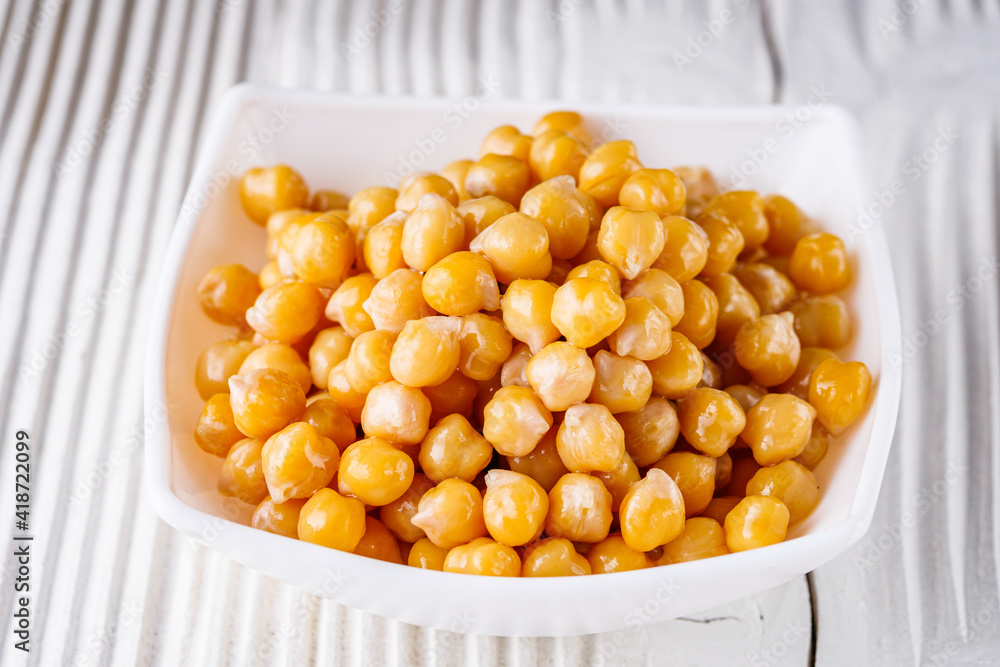 boiled chickpeas on a white wooden rustic background boiled chickpeas on a white wooden rustic background