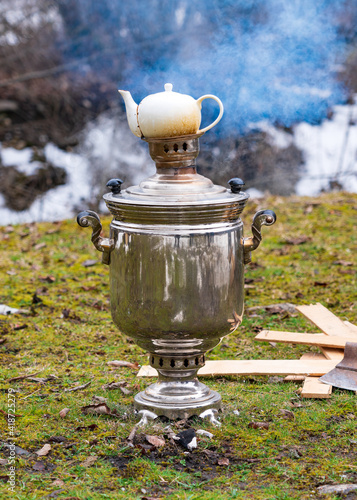 Boiling samovar, tea party outdoor picnic