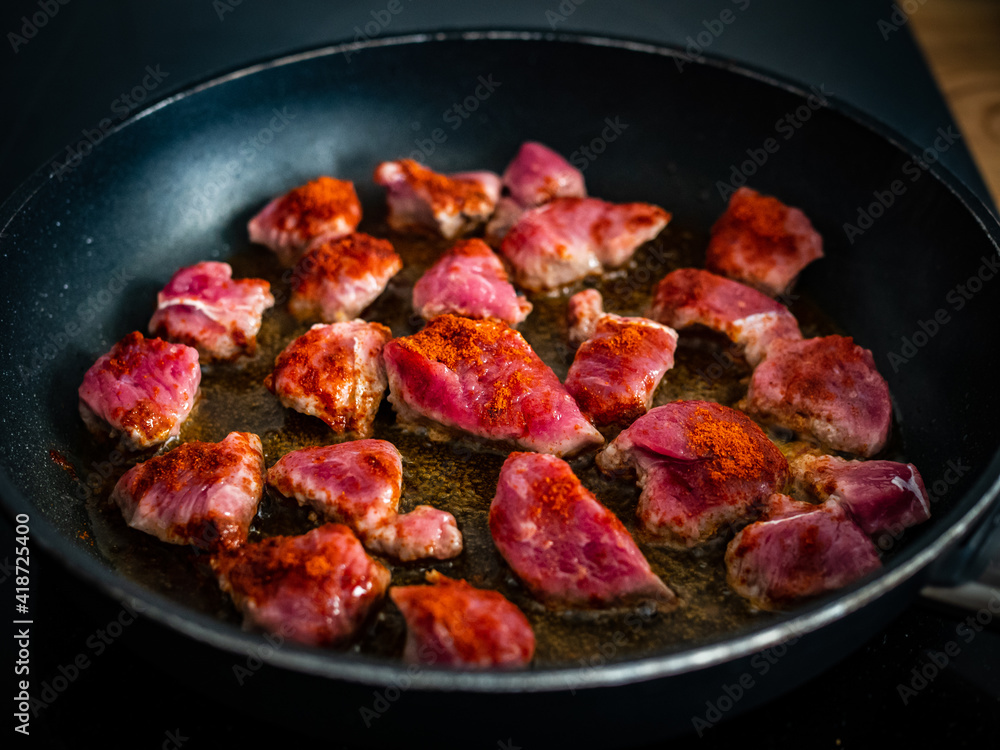 Veal nuggets in frying pan
