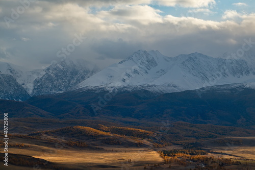 Russia. South Of Western Siberia, Mountain Altai. Autumn sunset in the North-Chuyskiy mountain range in the heart of the Kurai steppe.