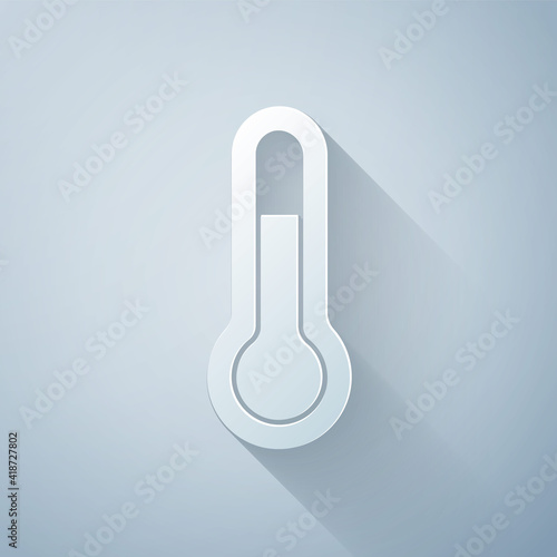 Paper cut Meteorology thermometer measuring icon isolated on grey background. Thermometer equipment showing hot or cold weather. Paper art style. Vector Illustration.