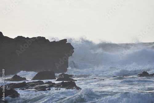 Watching the waves from the cliff