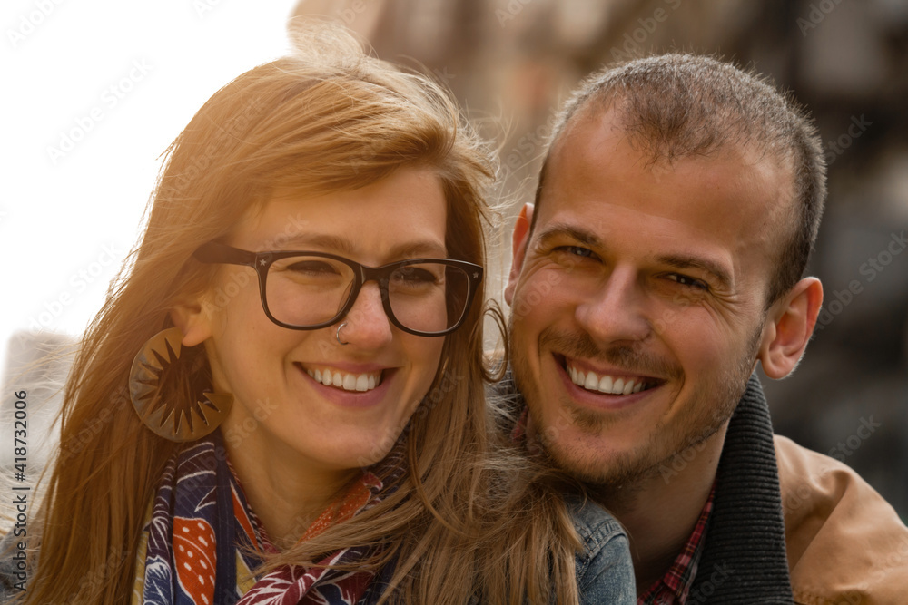 Young couple enjoying on the urban streets. Young couple enjoying on the urban streets.