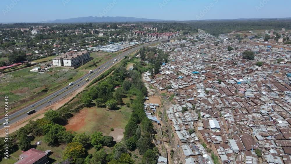 Aerial view over Kibera rusted metal rooftops, largest slum in Africa Aerial view over Kibera rusted metal rooftops, largest slum in Africa