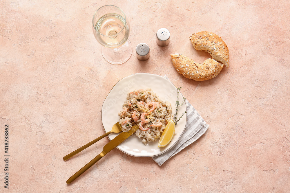 Plate with tasty risotto on color background Plate with tasty risotto on color background