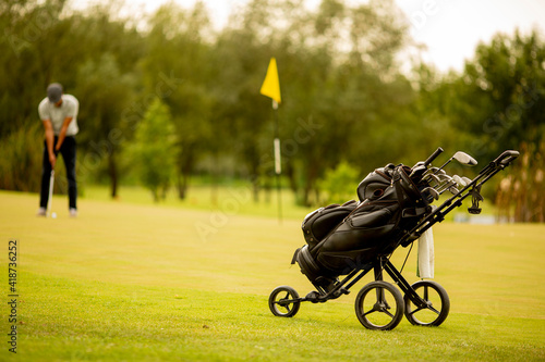 Young man playing golf