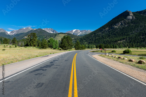 View of the US route 34 at the Rocky Mountains National Park, near the west horseshoue park, in the State of Colorado, USA