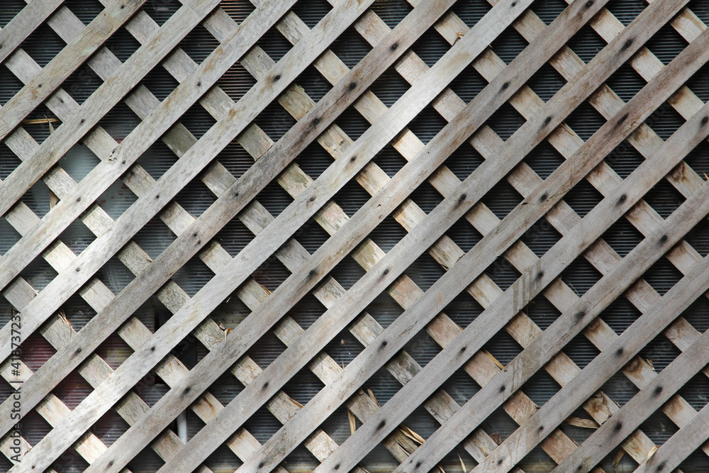 Crossed diagonal old wooden planks background. Crossed diagonal old wooden planks background.