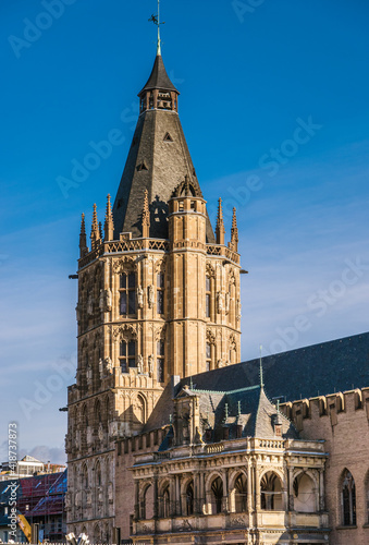 Cologne Koln, Germany: Medieval Tower and Loggia of the City Hall Building (Kolner Rathaus) with Blue Sky