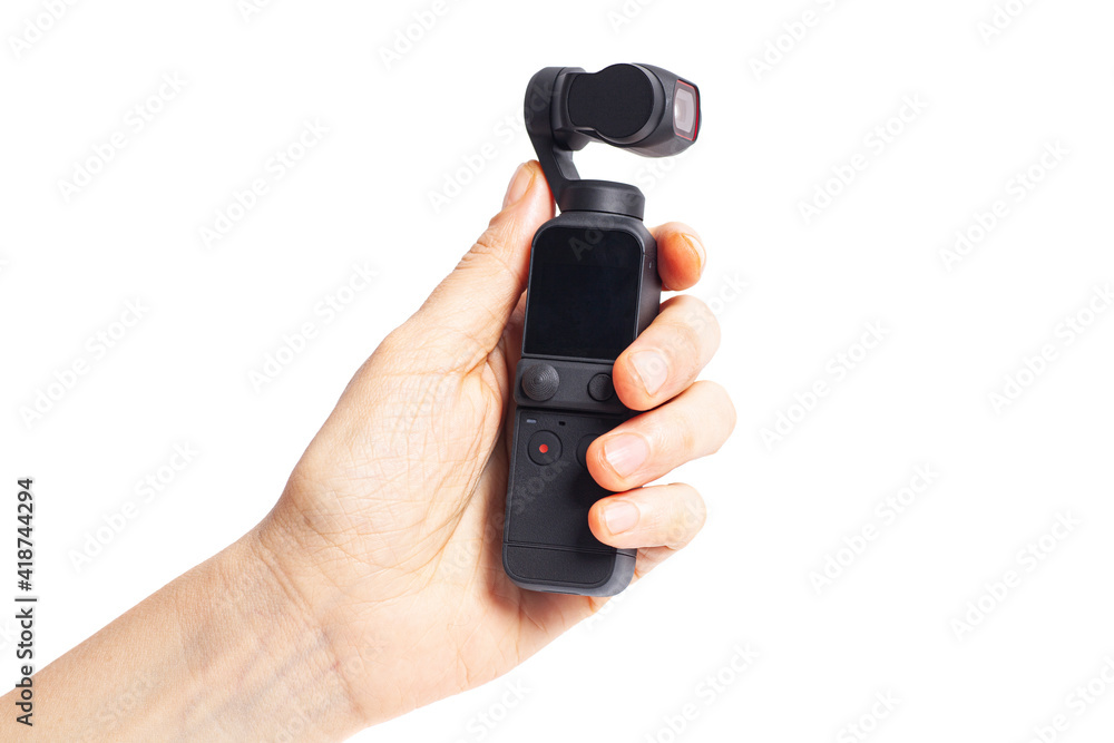 Hand hold action camera isolated on white background Hand hold action camera isolated on white background