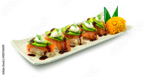 Salmon Sushi Nigiri ontop Avocado And Sauce Japaneses Food