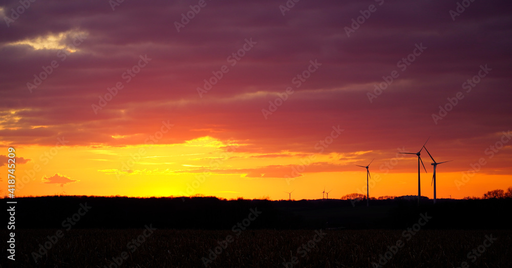 Landscape in the evening in North Rhine Westphalia. Sunset in winter with a dark silhouette. Landscape in the evening in North Rhine Westphalia. Sunset in winter with a dark silhouette.