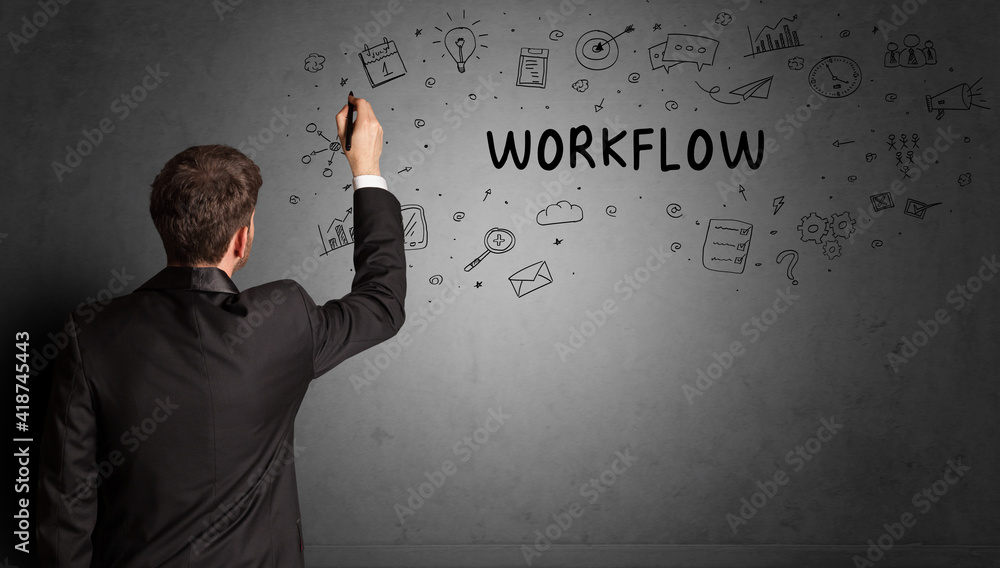 businessman drawing a creative idea sketch with WORKFLOW inscription, business strategy concept businessman drawing a creative idea sketch with WORKFLOW inscription, business strategy concept