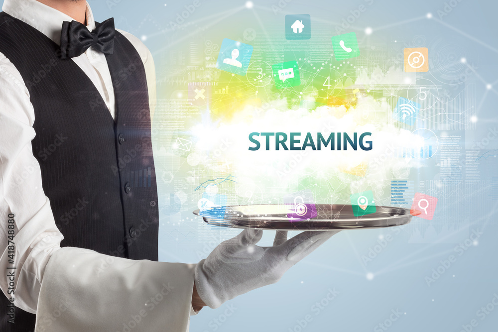 Waiter serving social networking concept with STREAMING inscription Waiter serving social networking concept with STREAMING inscription