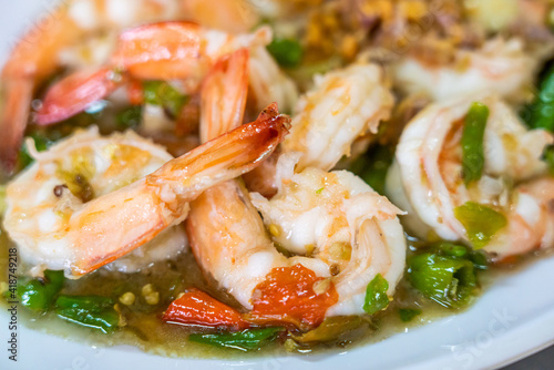 stir fried shrimp with thai chili and basil.