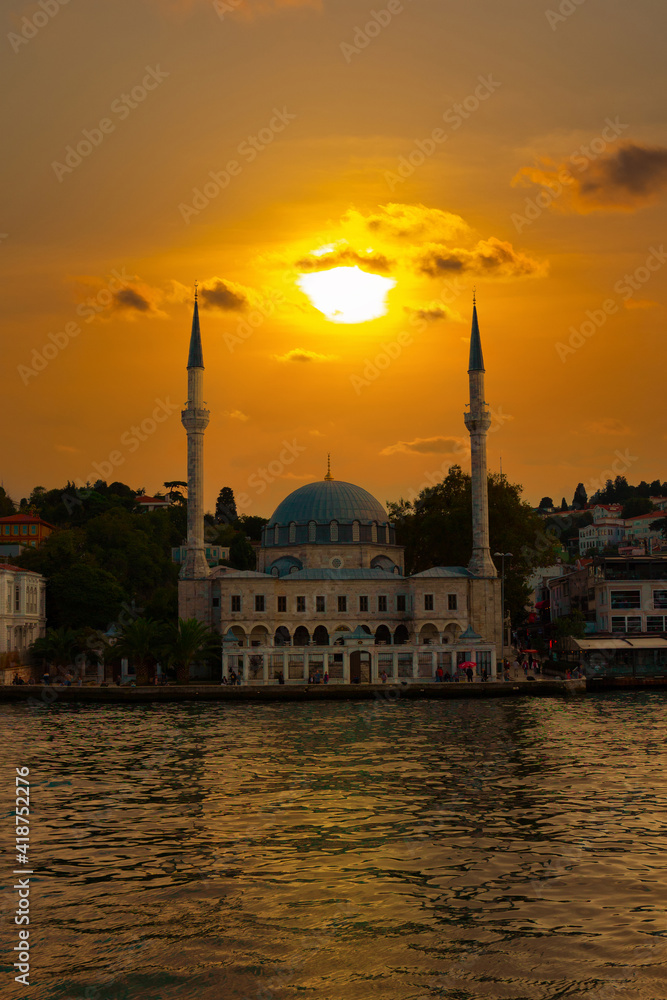Beylerbeyi Mosque at sunset. Evening view of Hamid-i Evvel Mosque, from the Bosporus in Istanbul, Turkey.